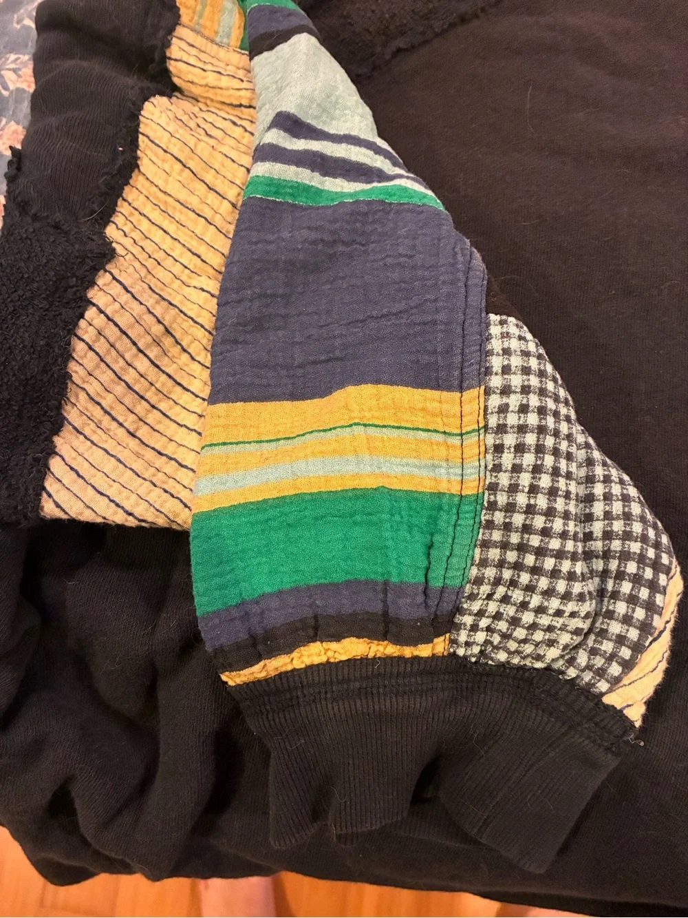 FREE PEOPLE We The Free Black Sweatshirt with Colorful Patchwork Sleeves sz M -